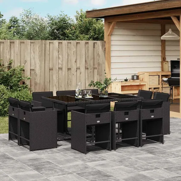 Ensemble à manger de jardin 11 pcs coussins noir résine tressée