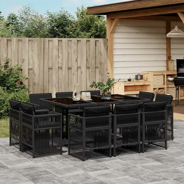 Ensemble à manger de jardin 11 pcs coussins noir résine tressée